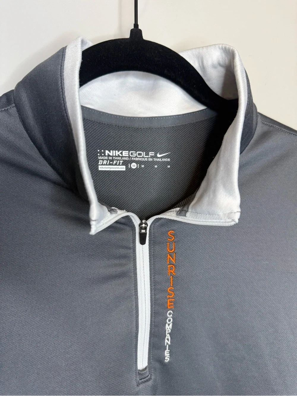 Nike Golf Dri-FIT 1/4 zip pullover featuring the 